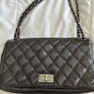 Chanel series 10 glazed caviar single flap mademoiselle lock handbag.